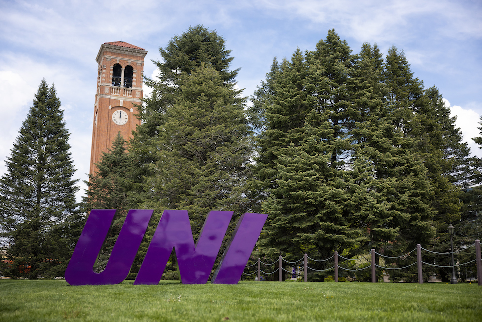 UNI letters in front of Campanile